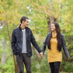 Couple at the park in autumn time