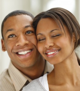 Closeup of happy young couple smiling