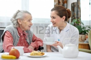 Senior Woman Eating Lunch in Retirement Home