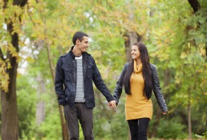 Couple at the park in autumn time